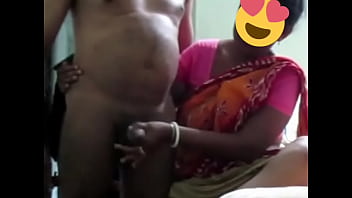 Sensual Desi Aunty’s Expert Hand Brings Him To A Powerful Climax