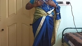 Horny Indian Wife Vanitha In A Tight Blue Saree, Her Big Tits Spilling Out And Shaved Cunt On Display, Rubbing Her Hard Nipples And Wet Pussy As She Fingers Herself