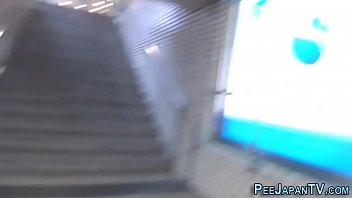 Asian Girl Peeing In The Subway Station