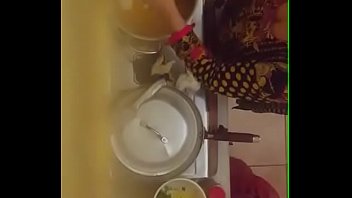 Desi Auntie’s Deep Cleavage And Voluptuous Curves