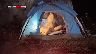 Sneaky Tent Tryst: Asian Teens Fuck Passionately As Others Sleep Nearby