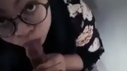 Headscarf-wearing Girlfriend Gives A Secret Blowjob In The Mall Restroom